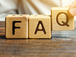 wooden blocks that spell FAQ