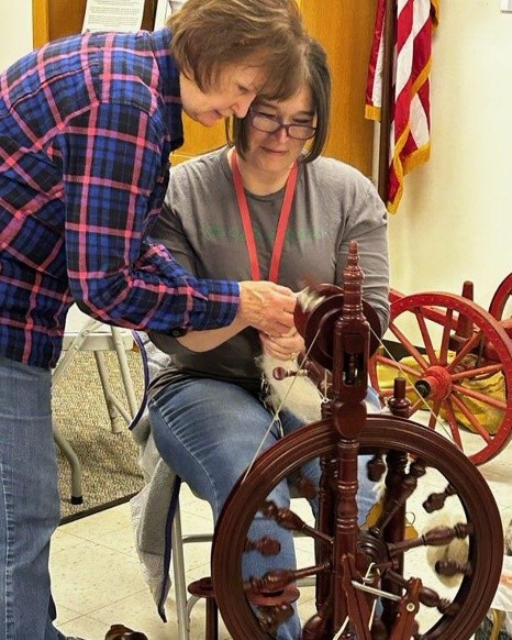 Artist teaching fiber craft
