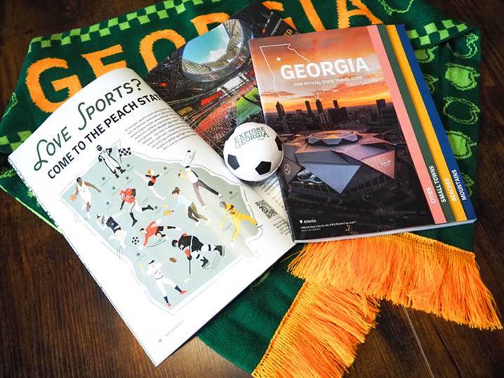 Travel Guide booklet open on a table