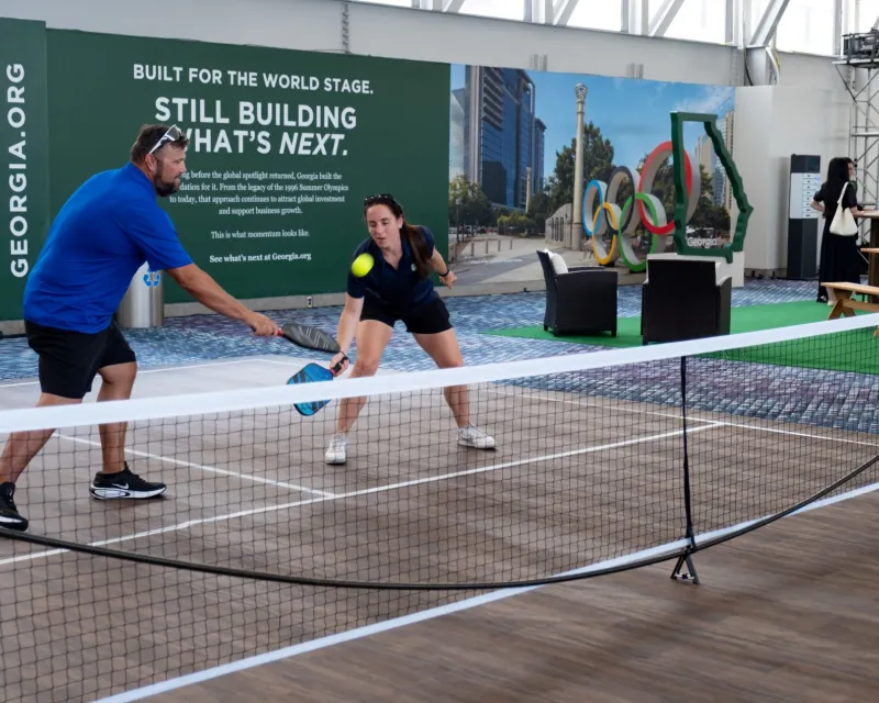 People playing pickle ball at GEORGIA, THE WHOLE DAY THROUGH