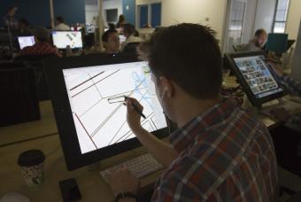 Man using technology to design/illustrate/animate in Georgia