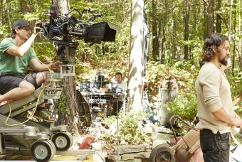 Crew on set filming in the woods in Georgia