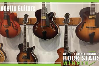 Benedetto Guitars hang on a wall in Georgia