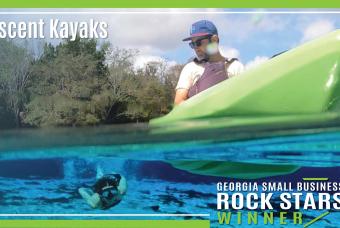 Two people kayak on a lake in Georgia with boats from Crescent Kayaks