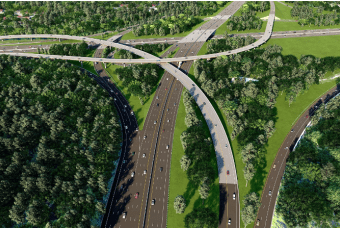 An aerial view of a highway with cars moving