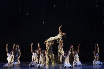 Dancers performing on stage.