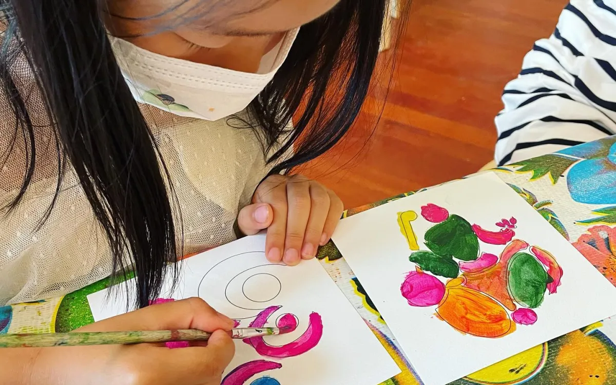 Girl painting a picture