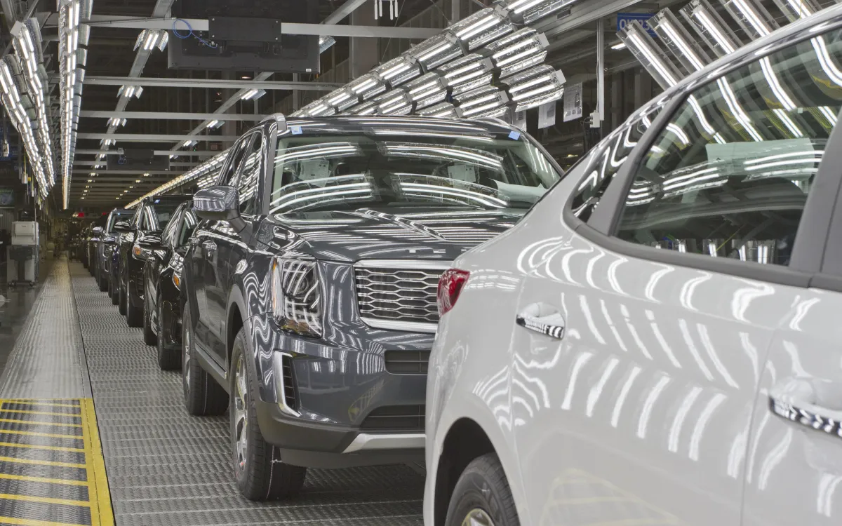 Cars on conveyer belt