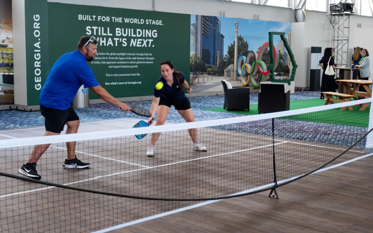 People playing pickle ball at GEORGIA, THE WHOLE DAY THROUGH