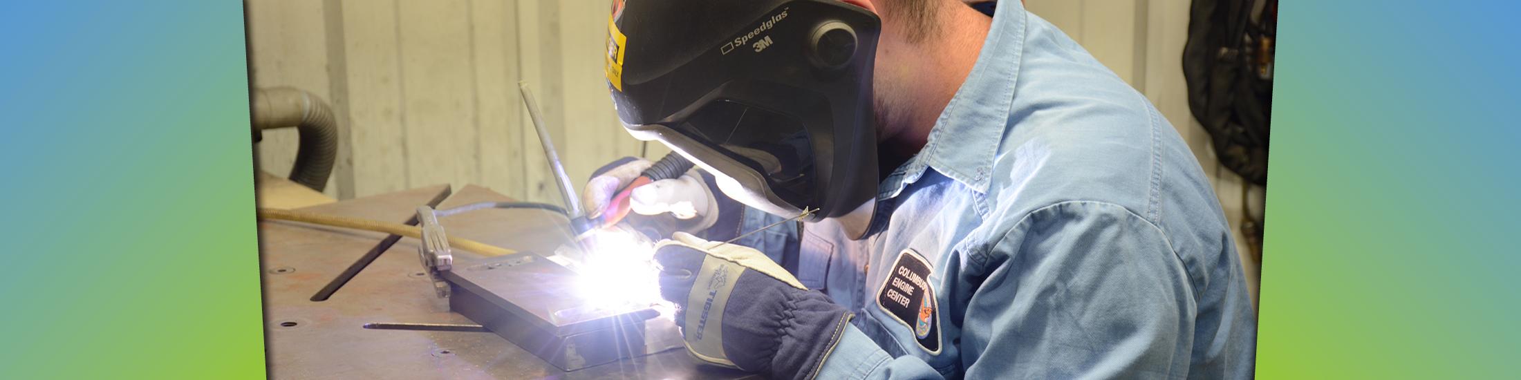 Close up of a person welding | Georgia Center of Innovation and Manufacturing Workforce Development