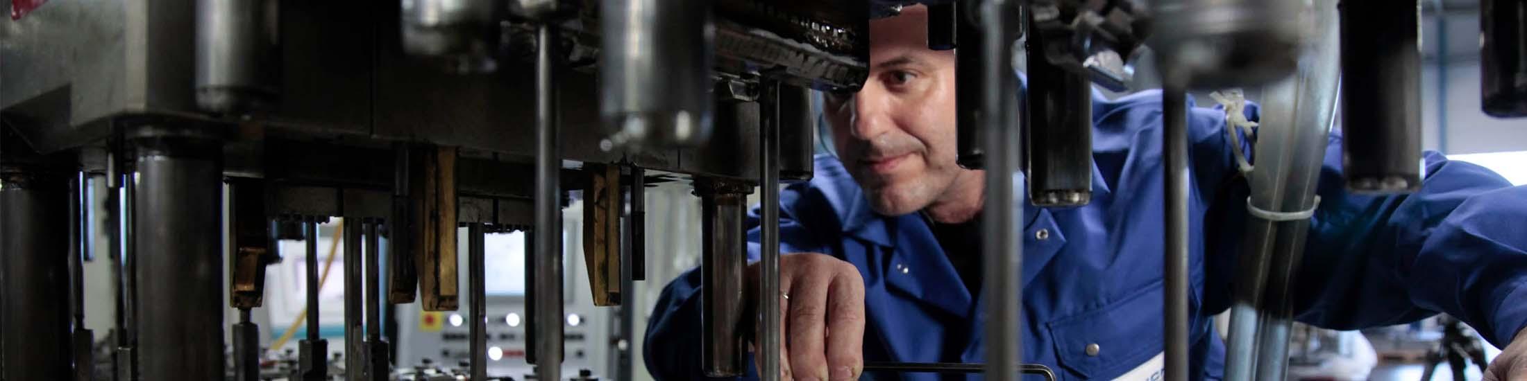 Man using manufacturing machine close up