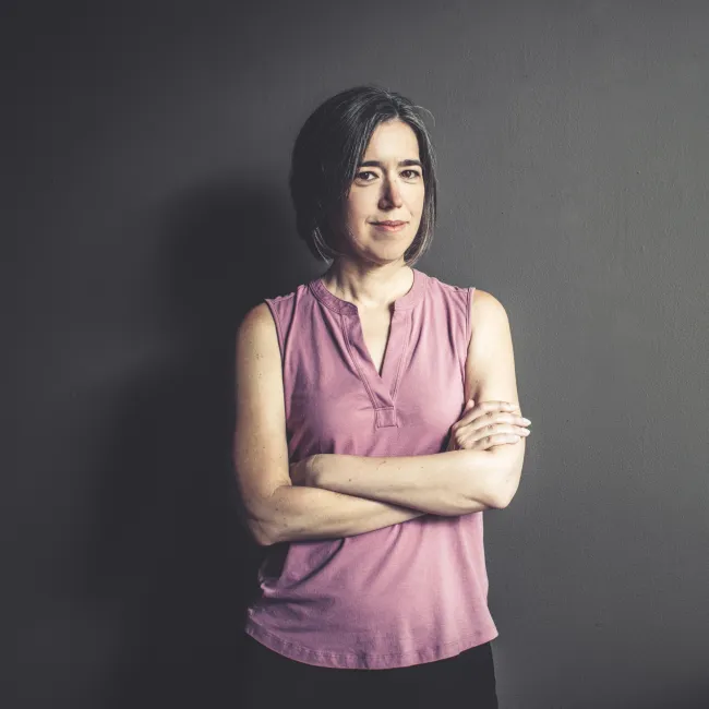woman posing with arms crossed