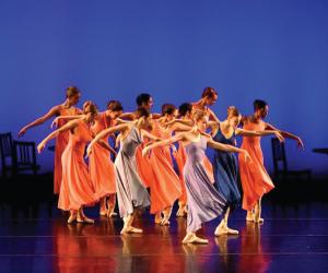 Dancers in colorful costumes on stage