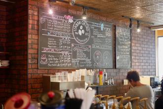 Urban Grind interior with chalk menu board, in Metro Atlanta