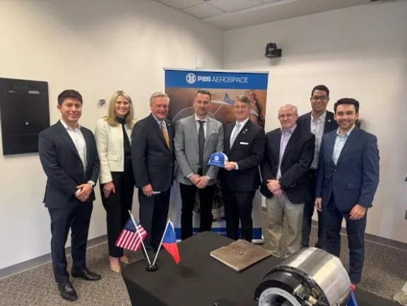 PBS Aerospace representatives with Commissioner Wilson